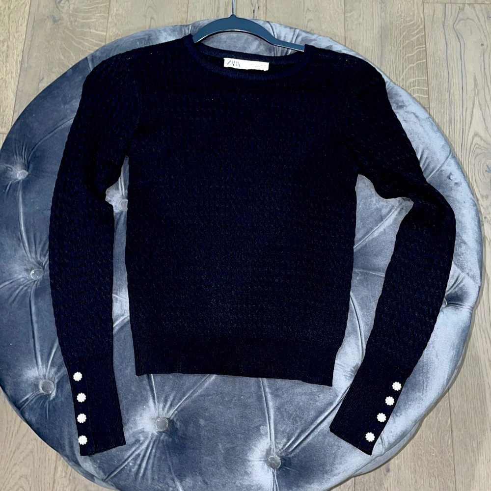Zara. New without tags. Black long sleeve sweater. Faux pearl button detail.